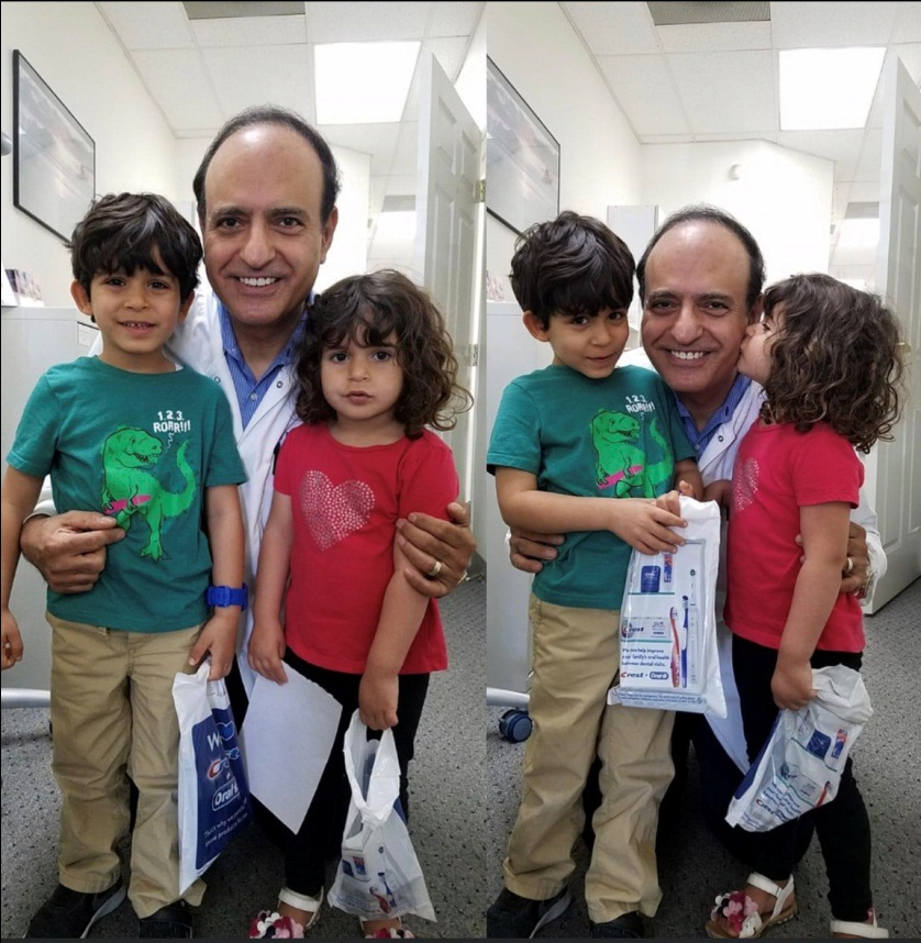 An image of Dr. Robert Khanian with a little girl and boy in his dental office in Tarzana, California