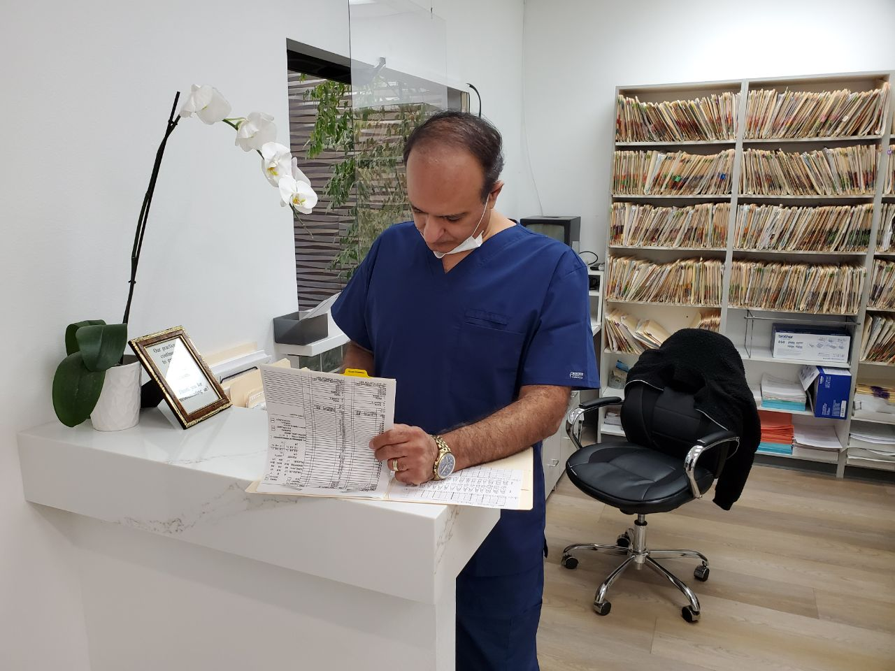 An image of Dr. Robert Khanian in his dental office in Tarzana, California